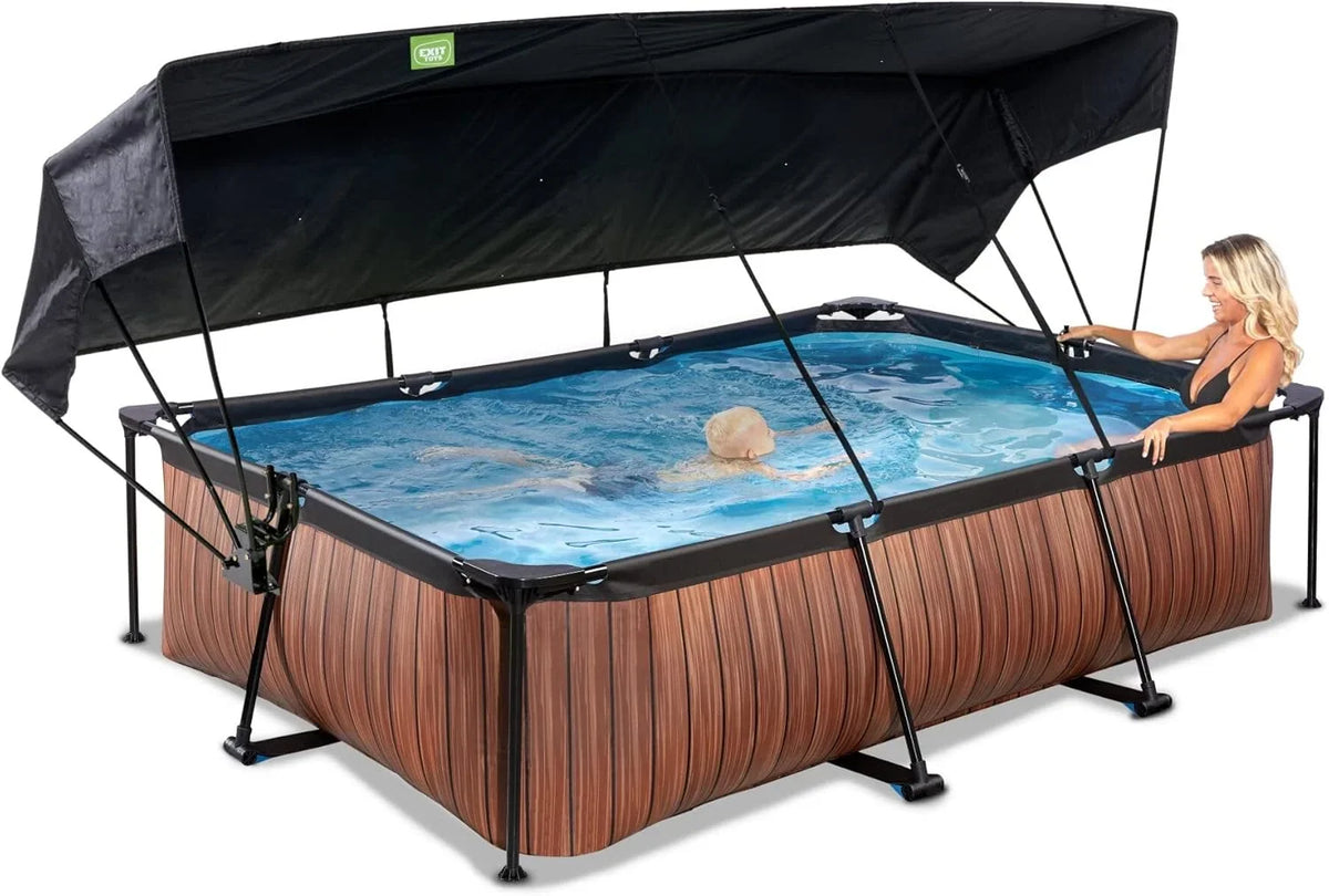 EXIT Toys Basen Drewniany z Daszkiem Słonecznym - 300x200x65cm - Kompaktowy Basen Prostokątny ze Stelażem z Pompą Filtracyjną Kartuszową - Optymalna Ochrona UV - Łatwy Dostęp - Unikalny Design - Brązowy